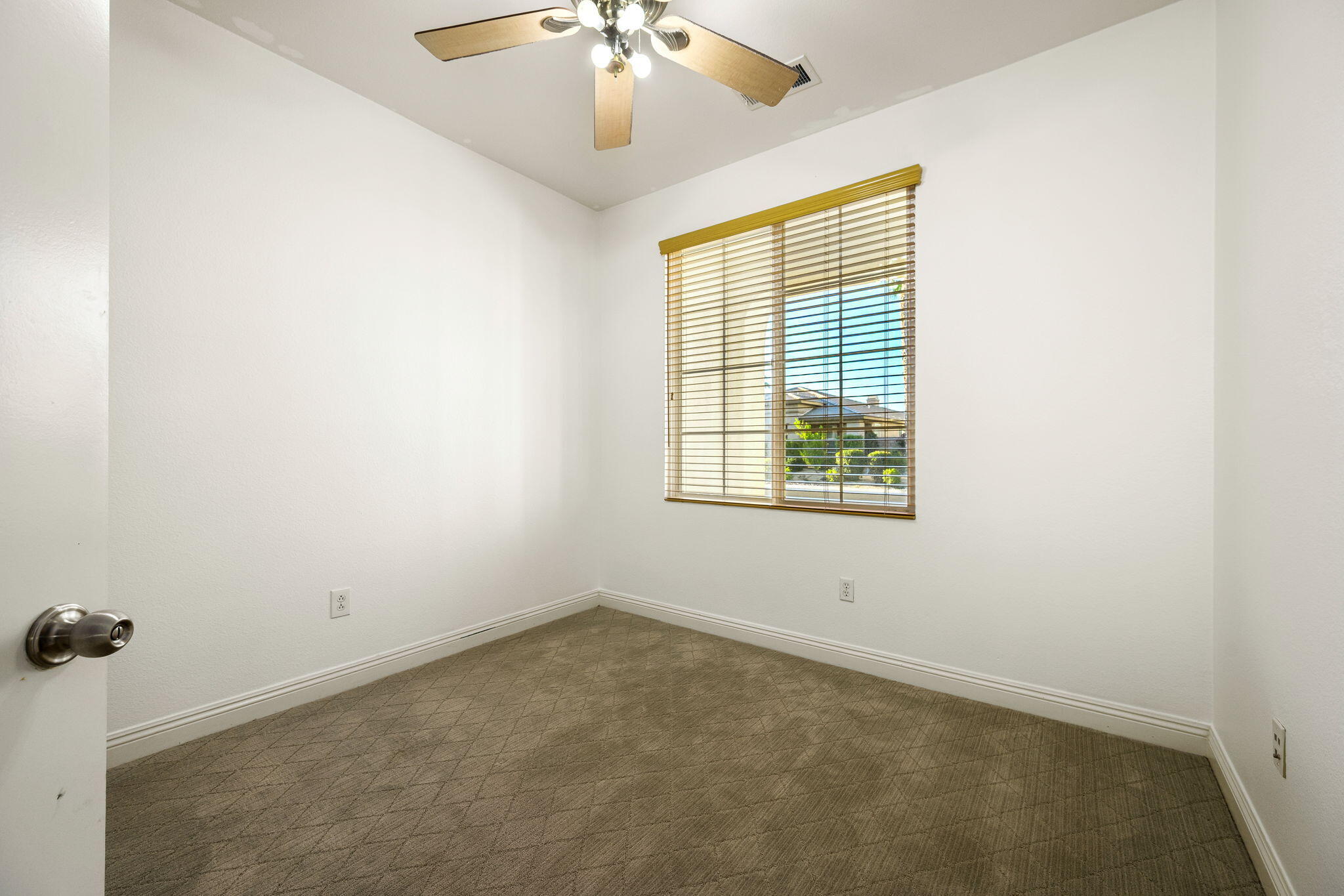 80510 Denton Drive Indio, CA 92203 - Photo 46 of 80 an empty room with a window