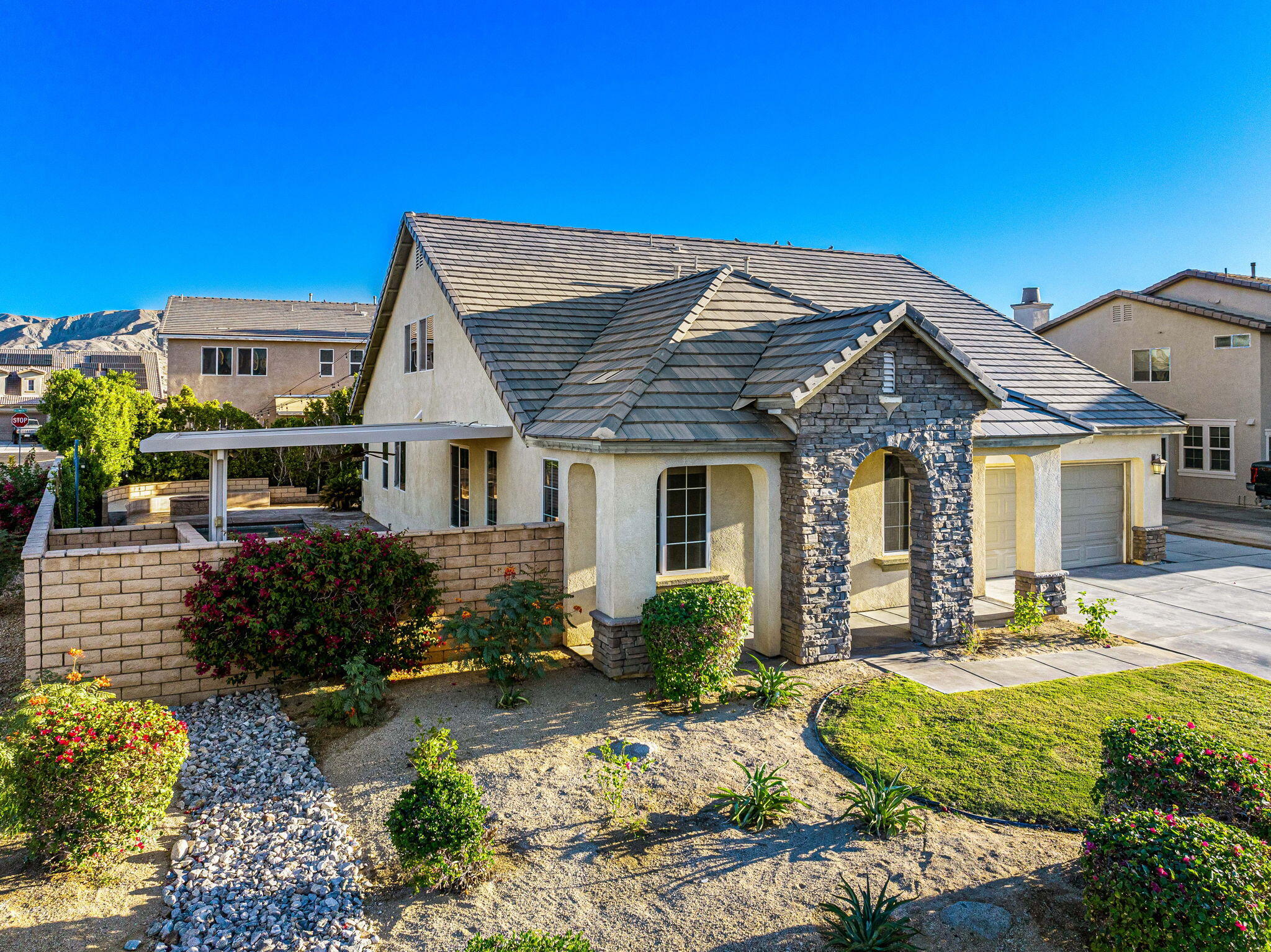 80510 Denton Drive Indio, CA 92203 - Photo 71 of 80 a front view of a house with garden