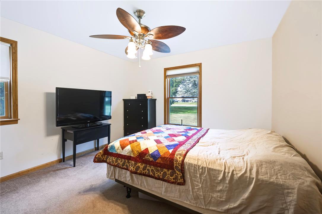 6970 Silver Crest Road Nazareth, PA 18064 - Photo 28 of 35 Natural wood window casings and cozy carpeting define this comfortable sleeping space.