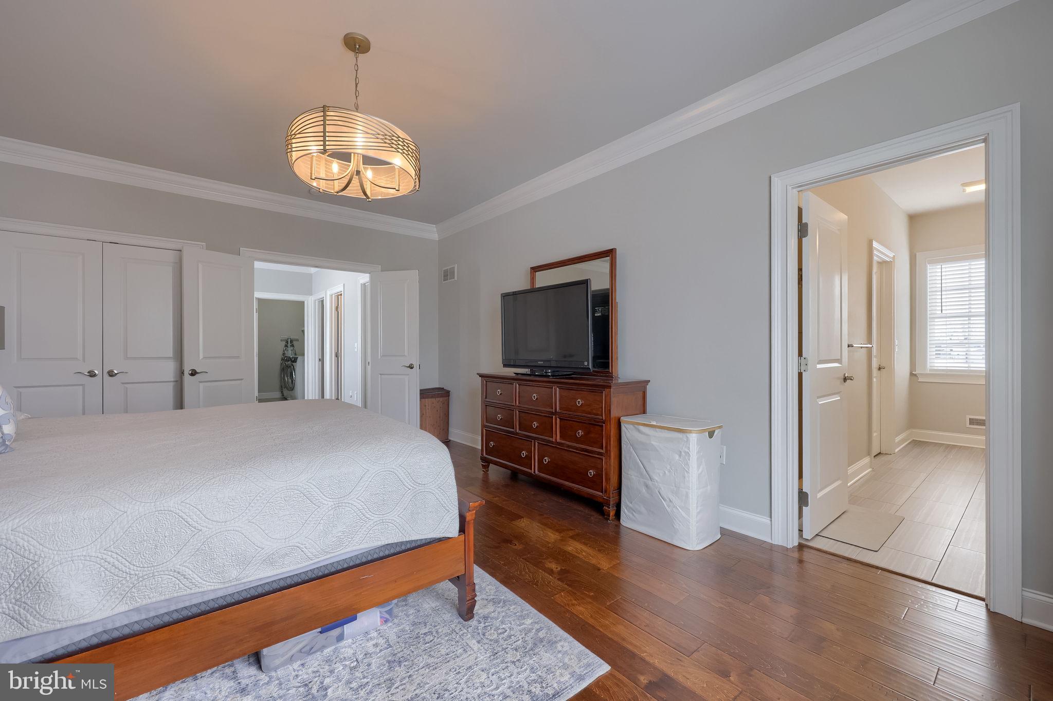512 East Delp Road Lancaster, PA 17601 - Photo 38 of 75 a bedroom with wooden floor and a bed