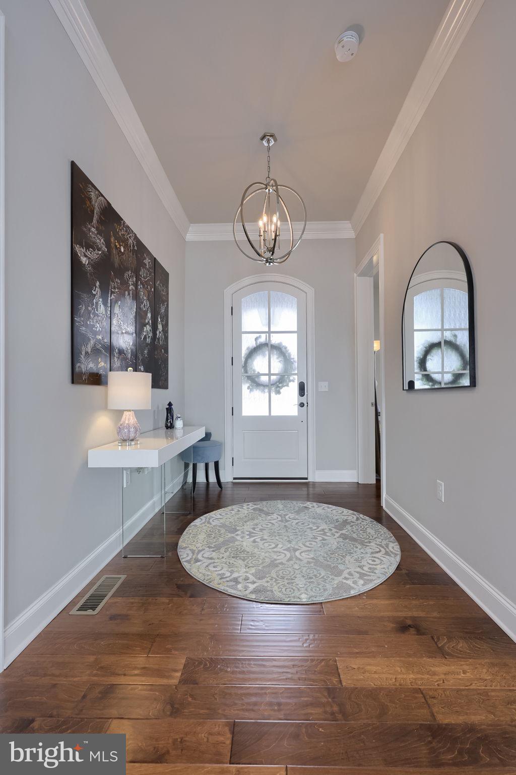 512 East Delp Road Lancaster, PA 17601 - Photo 4 of 75 a view of a livingroom with furniture wooden floor a chandelier and windows