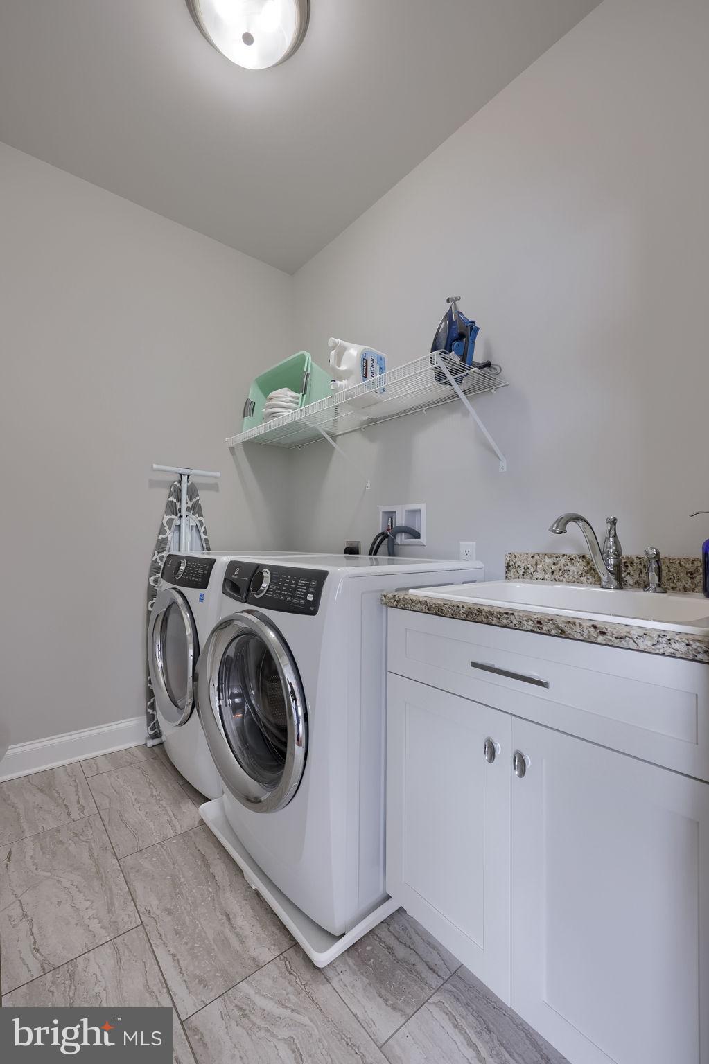 512 East Delp Road Lancaster, PA 17601 - Photo 44 of 75 a utility room with sink dryer and washer