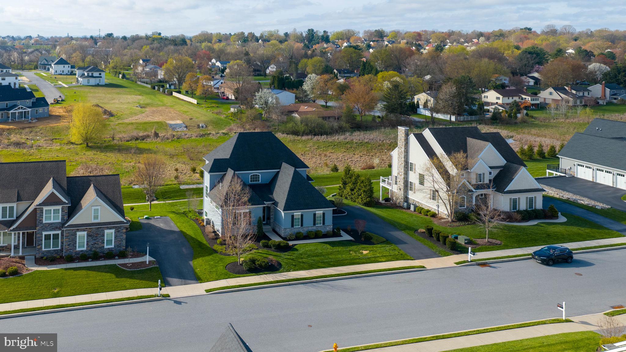 512 East Delp Road Lancaster, PA 17601 - Photo 63 of 75 an aerial view of houses with a swimming pool