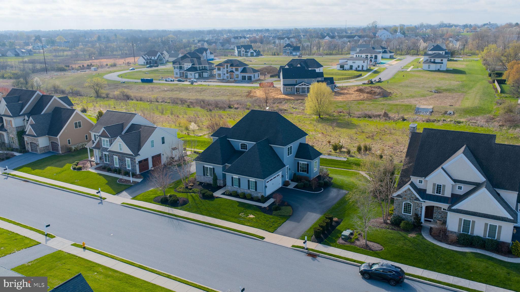 512 East Delp Road Lancaster, PA 17601 - Photo 65 of 75 an aerial view of a house with a garden and lake view