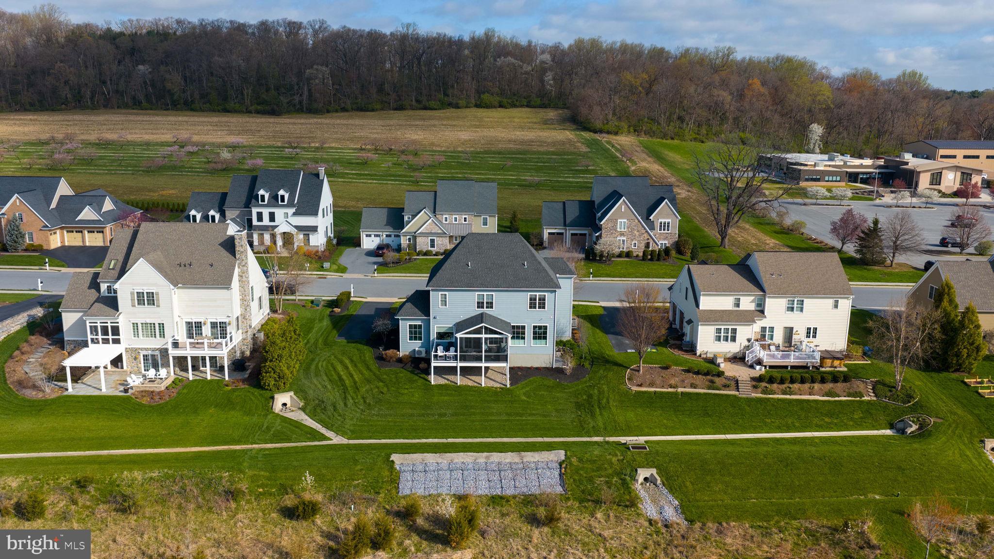 512 East Delp Road Lancaster, PA 17601 - Photo 66 of 75 an aerial view of a house with a garden and lake view