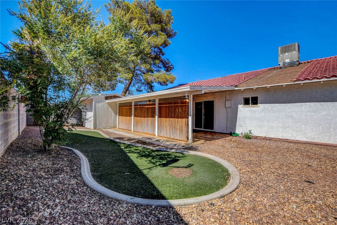 4367 South Mojave Road Las Vegas, NV 89121 - Photo 50 of 53 A private backyard oasis features a covered patio and low-maintenance landscaping for effortless outdoor living.