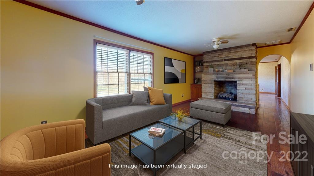219 Ridge Road Marion, NC 28752 - Photo 16 of 28 a living room with furniture and a fireplace
