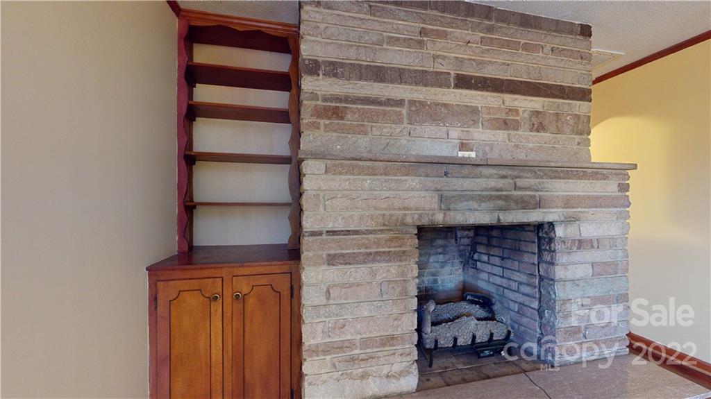 219 Ridge Road Marion, NC 28752 - Photo 17 of 28 a living room with a fireplace