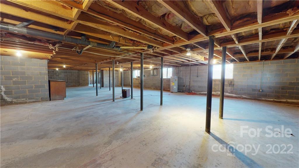 219 Ridge Road Marion, NC 28752 - Photo 27 of 28 a view of empty room with wooden ceiling