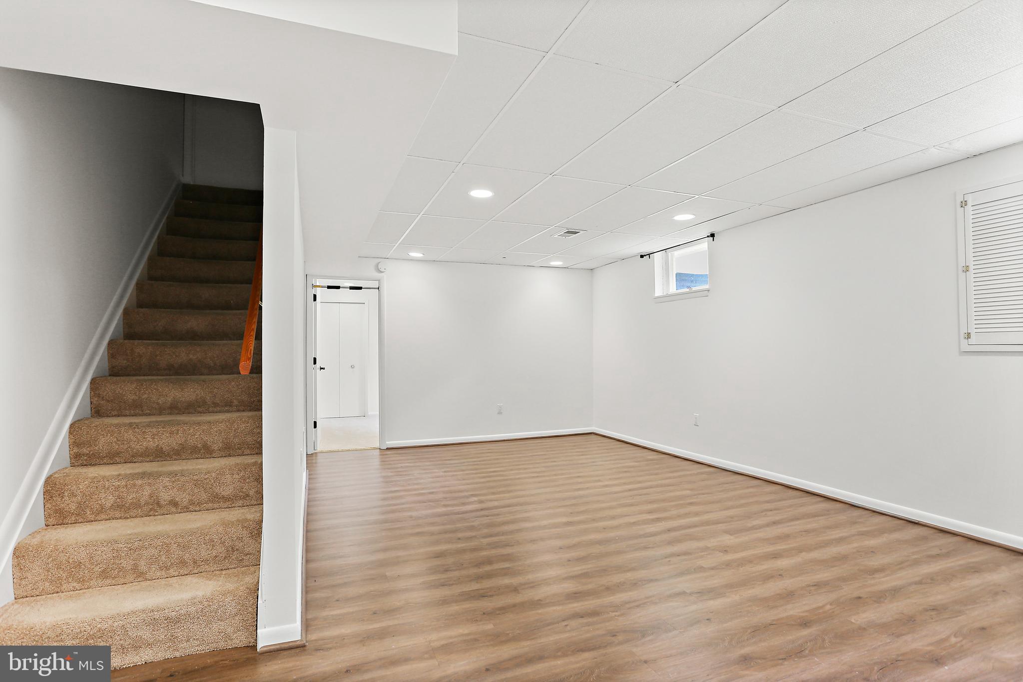 6914 Parchment Rise Columbia, MD 21044 - Photo 28 of 39 Recreation room - luxury vinyl plank flooring 2019
