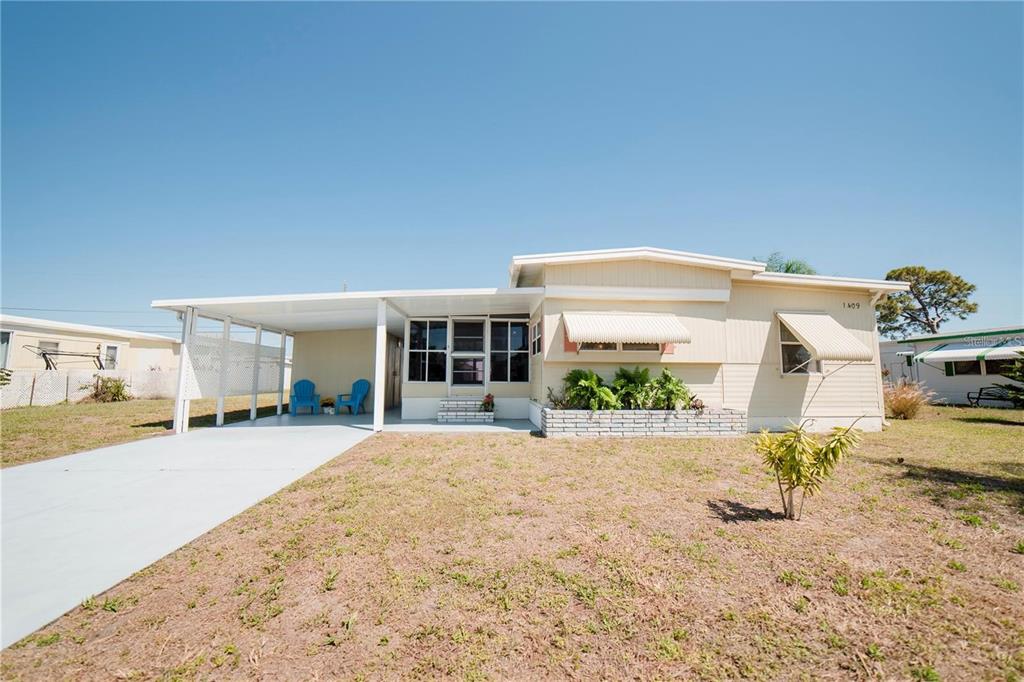 1409 Ibis (lot 20) Drive Englewood, FL 34224 - Photo 4 of 4 a view of a house with a patio