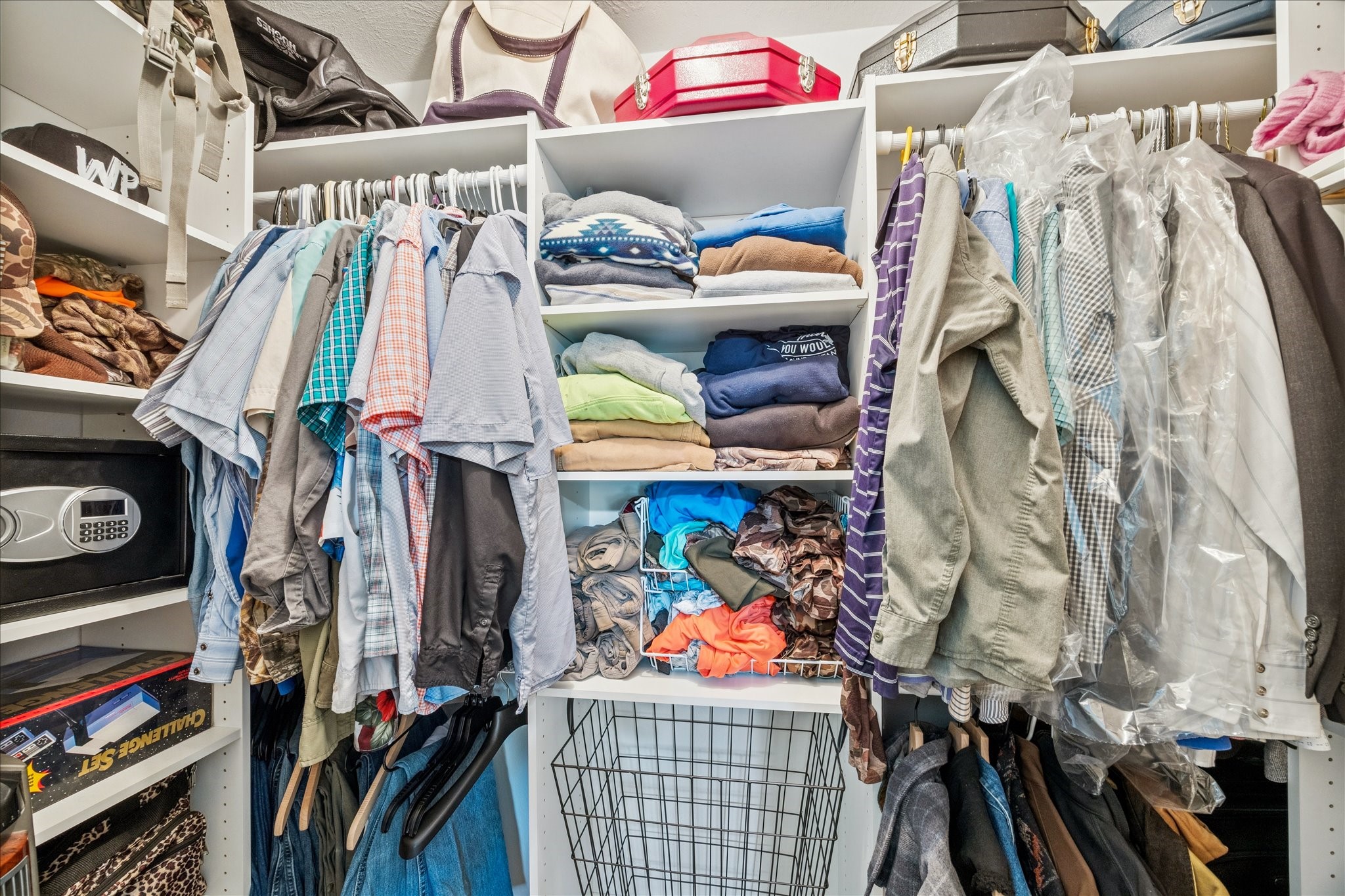 19115 Frey Road Hempstead, TX 77445 - Photo 17 of 35 a view of walk in closet with clothes and shoes