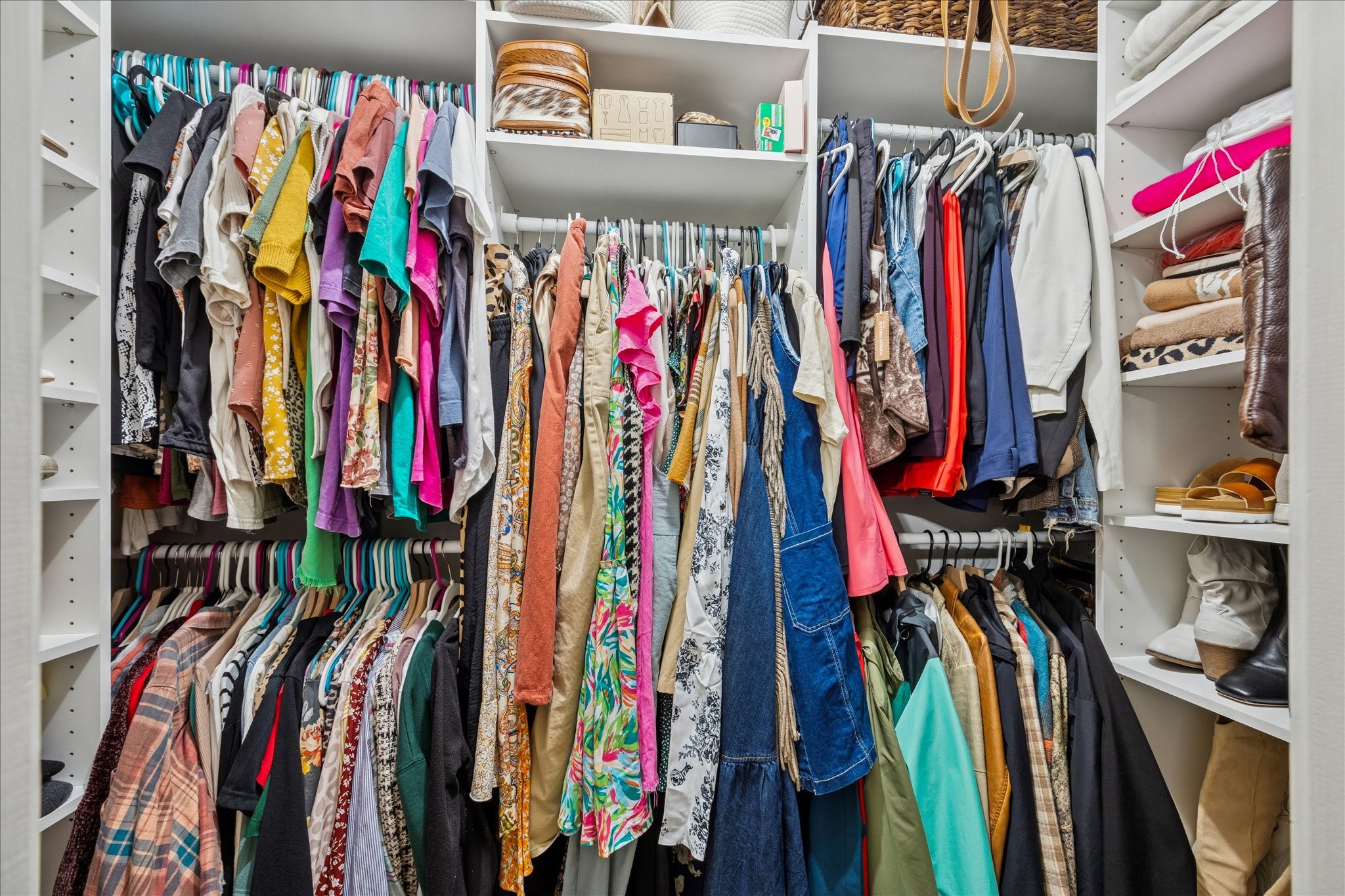 19115 Frey Road Hempstead, TX 77445 - Photo 18 of 35 a view of walk in closet with clothes