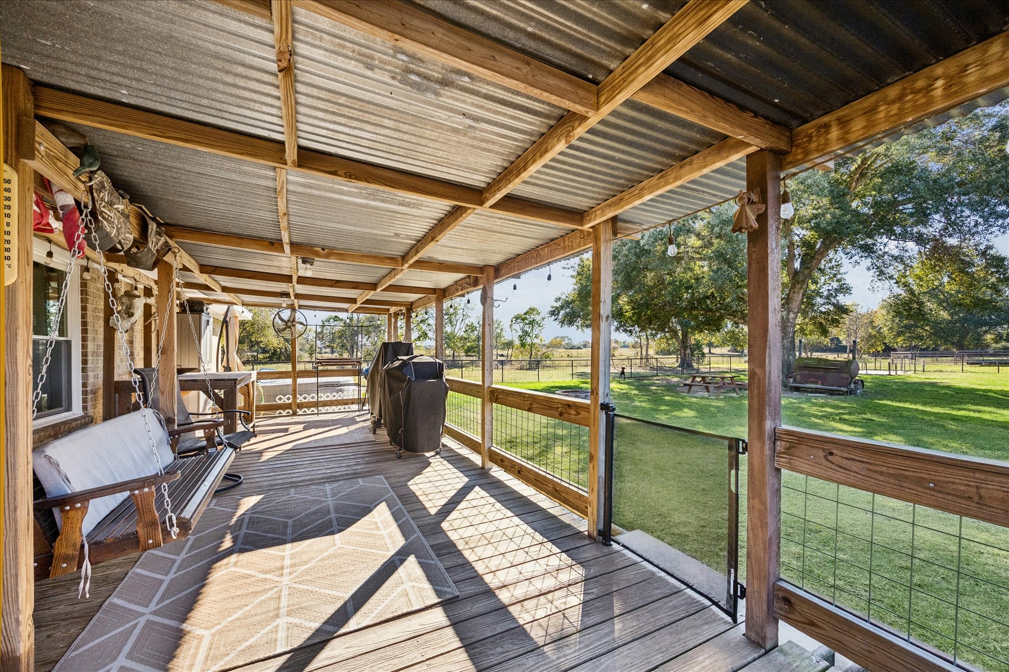 19115 Frey Road Hempstead, TX 77445 - Photo 27 of 35 a view of a patio with wooden floor