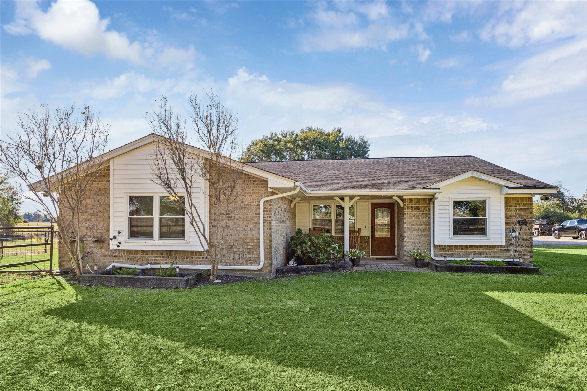 19115 Frey Road Hempstead, TX 77445 - Photo 3 of 35 a front view of house with yard and green space