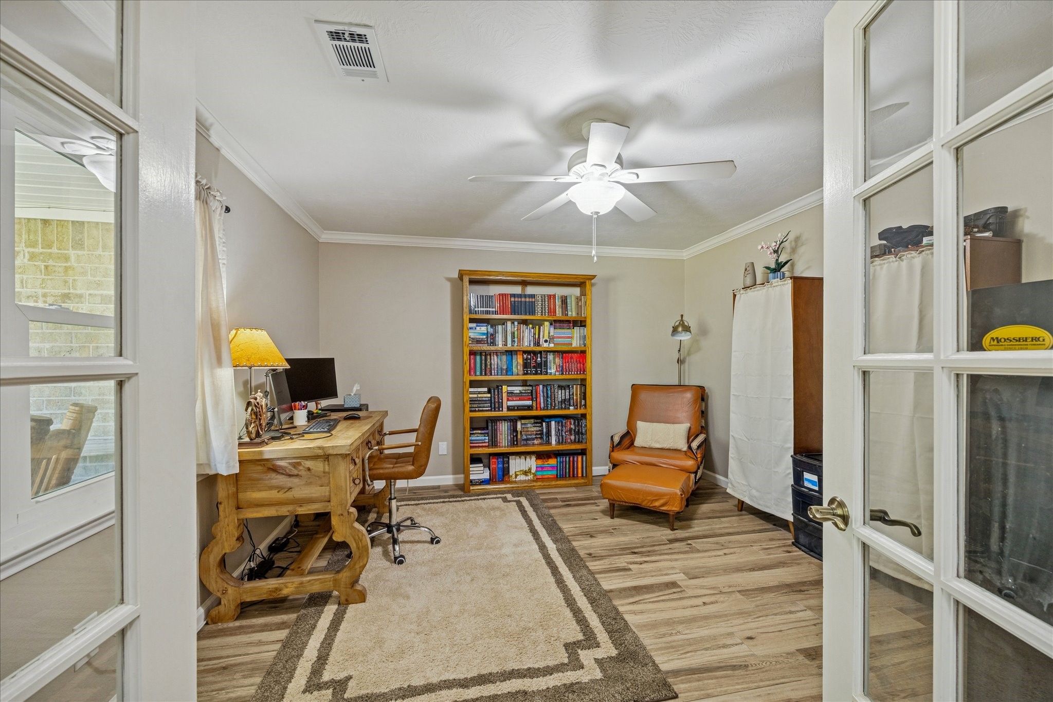 19115 Frey Road Hempstead, TX 77445 - Photo 7 of 35 a view of a workspace with furniture and a window