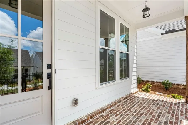 a view of a door and a window