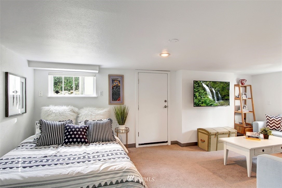 428 3rd Avenue North Edmonds, WA 98020 - Photo 17 of 21 a living room with a bed and a window