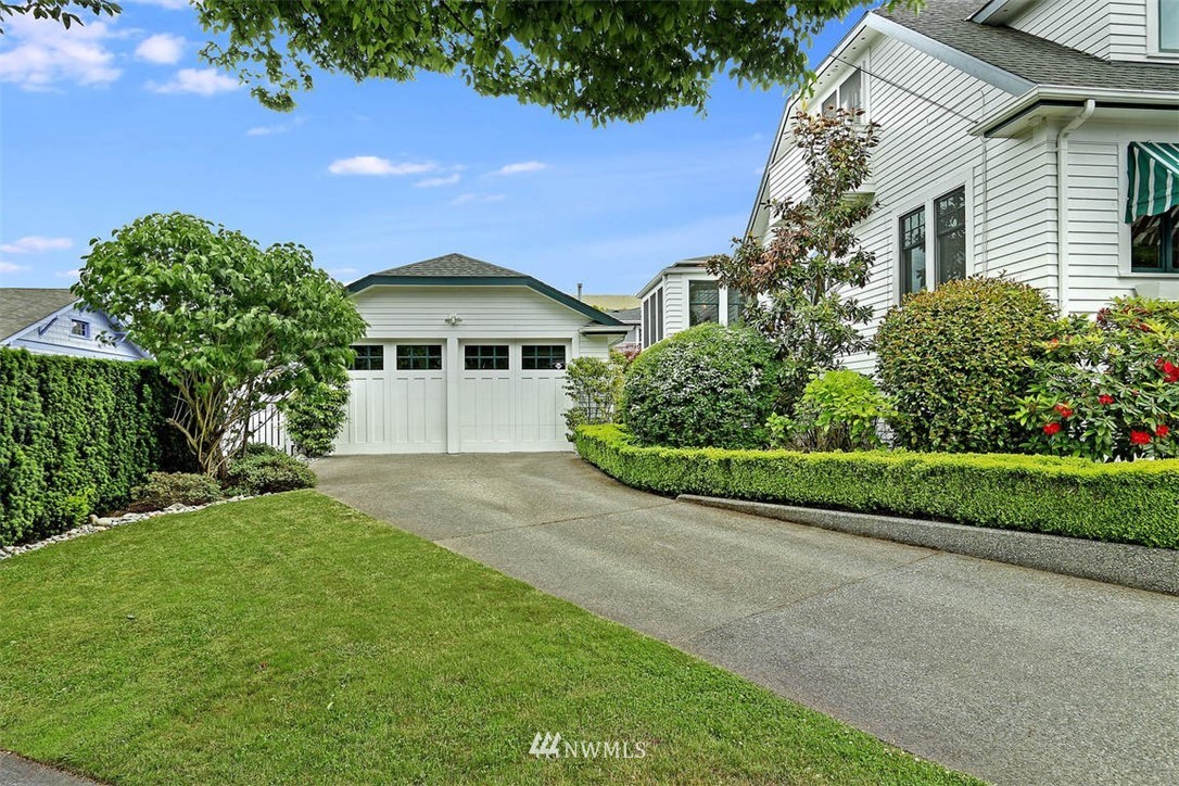 428 3rd Avenue North Edmonds, WA 98020 - Photo 21 of 21 a front view of a house with a yard and garage