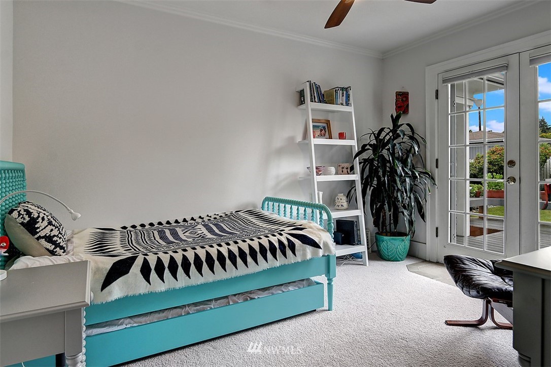 428 3rd Avenue North Edmonds, WA 98020 - Photo 9 of 21 a bedroom with a bed and a window