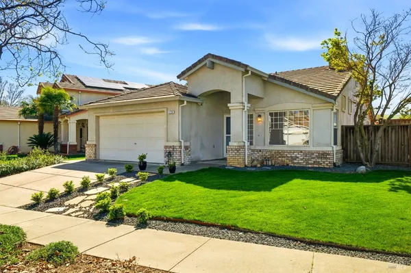 a front view of house with yard