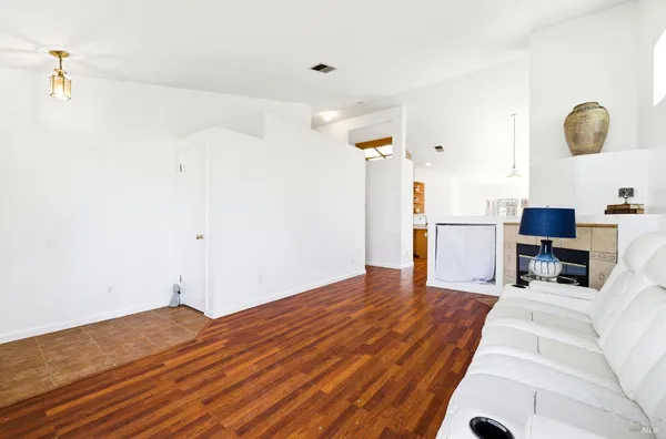a view of a livingroom with wooden floor