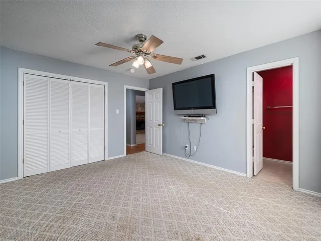 a view of a livingroom with a flat screen tv