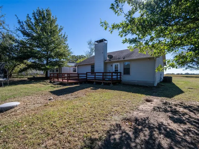 a view of a house with swimming pool
