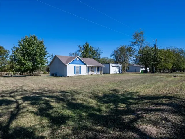 a view of house with outdoor space