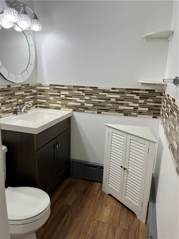 300 Highland Road Pittsburgh, PA 15235 - Photo 15 of 40 a bathroom with a sink a toilet and mirror