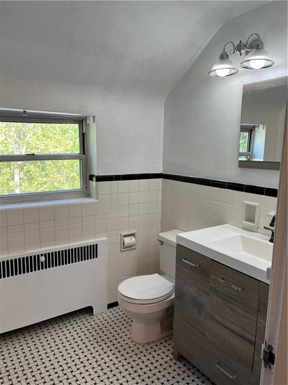 300 Highland Road Pittsburgh, PA 15235 - Photo 24 of 40 a bathroom with a toilet a sink and a window