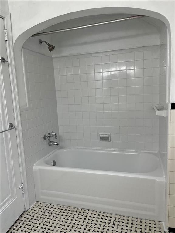 300 Highland Road Pittsburgh, PA 15235 - Photo 25 of 40 a bathroom with a bathtub and a shower