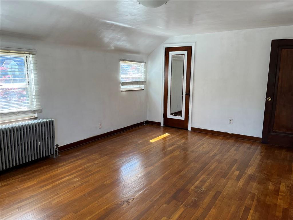 300 Highland Road Pittsburgh, PA 15235 - Photo 28 of 40 a view of an empty room with wooden floor and a window