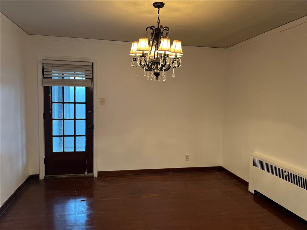 300 Highland Road Pittsburgh, PA 15235 - Photo 10 of 40 a view of an empty room with wooden floor and a window