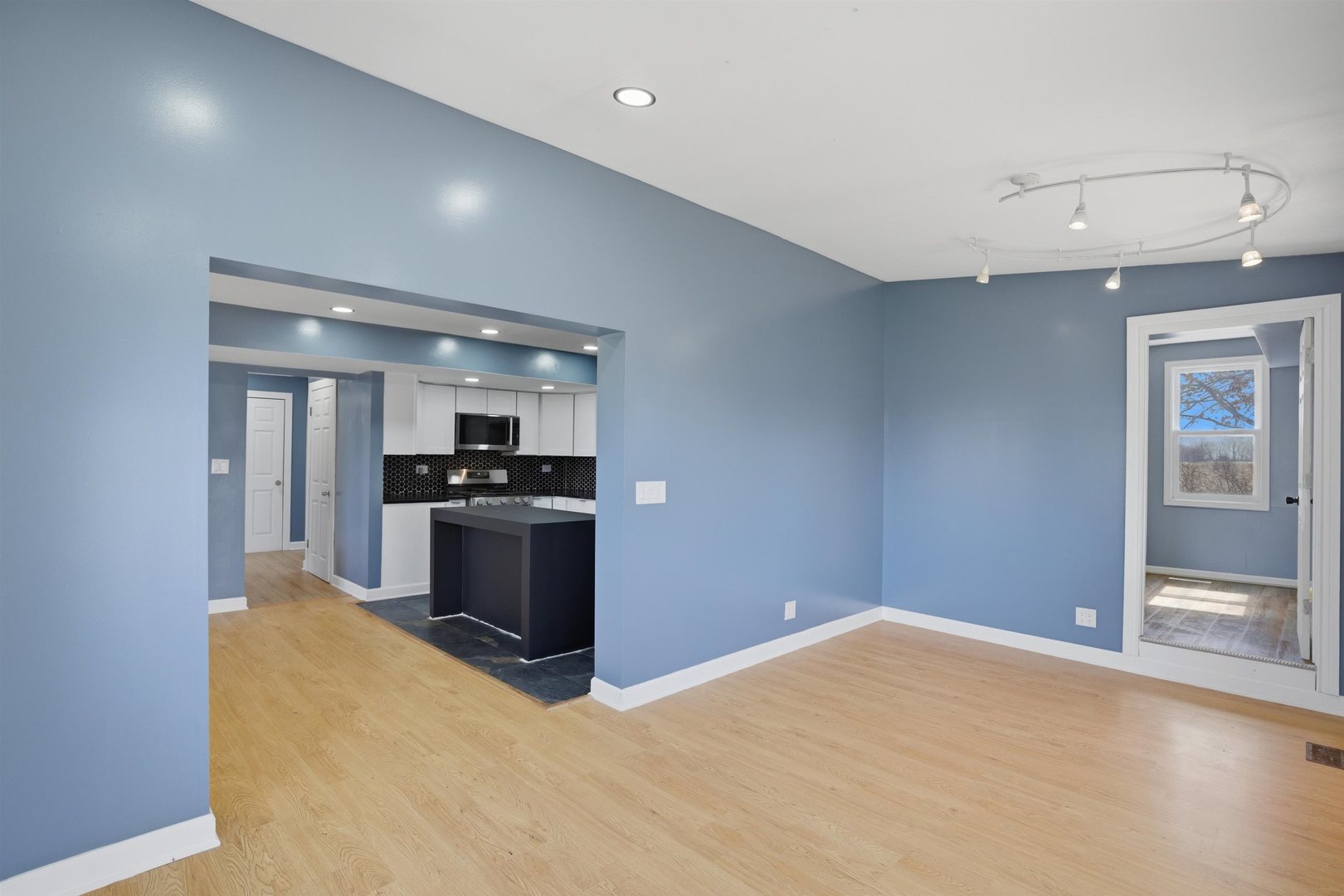 17N620 Ketchum Road Hampshire, IL 60140 - Photo 21 of 50 a large kitchen with a stove and a refrigerator