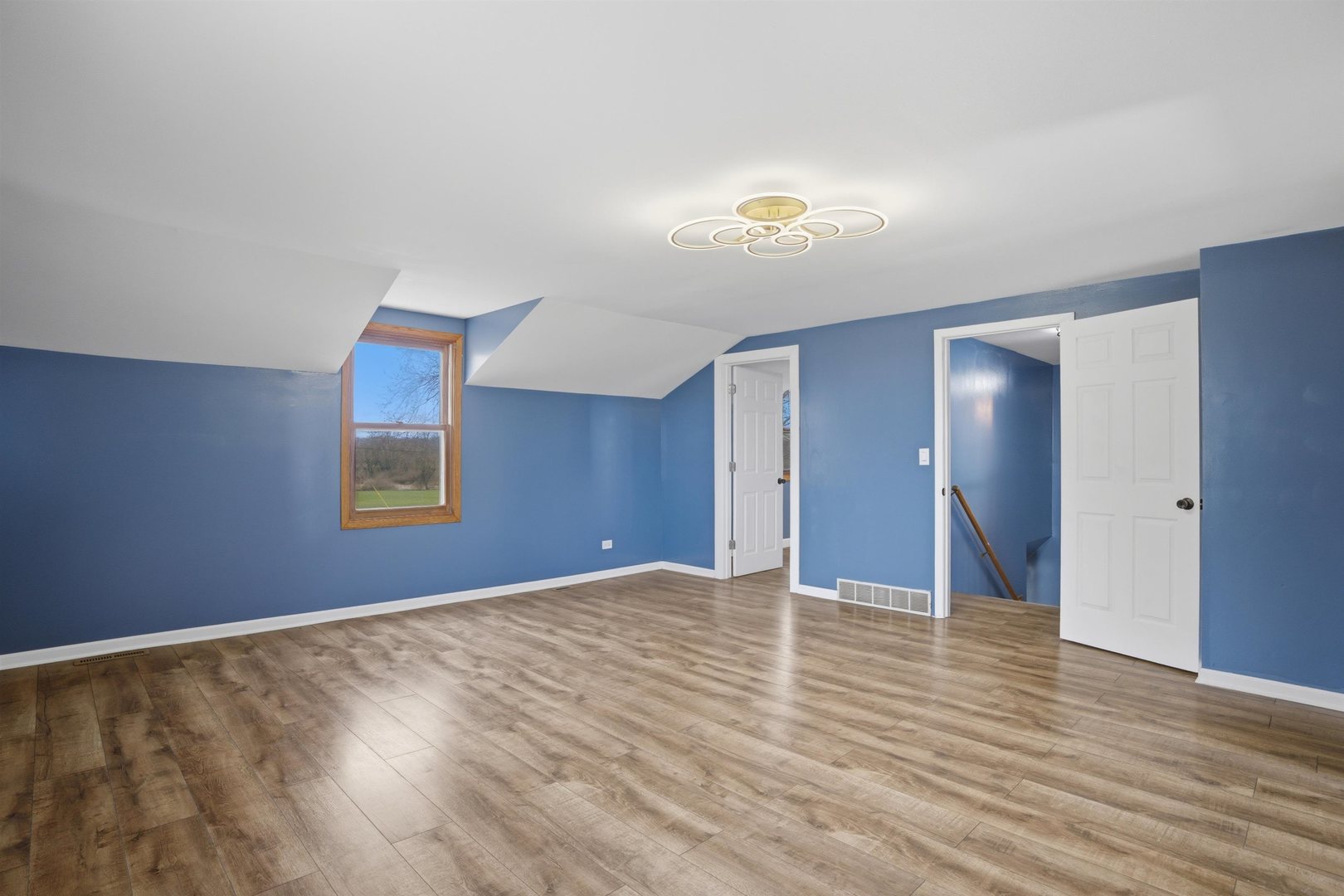 17N620 Ketchum Road Hampshire, IL 60140 - Photo 29 of 50 a view of an empty room with window and wooden floor