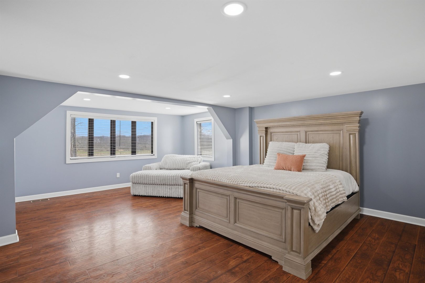 17N620 Ketchum Road Hampshire, IL 60140 - Photo 33 of 50 a bedroom with a large bed and a window with couch