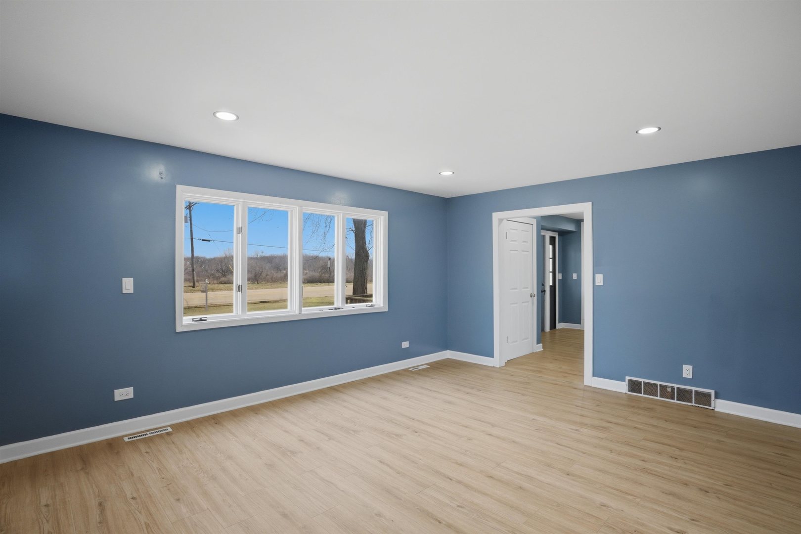17N620 Ketchum Road Hampshire, IL 60140 - Photo 37 of 50 a view of an empty room with wooden floor and a window