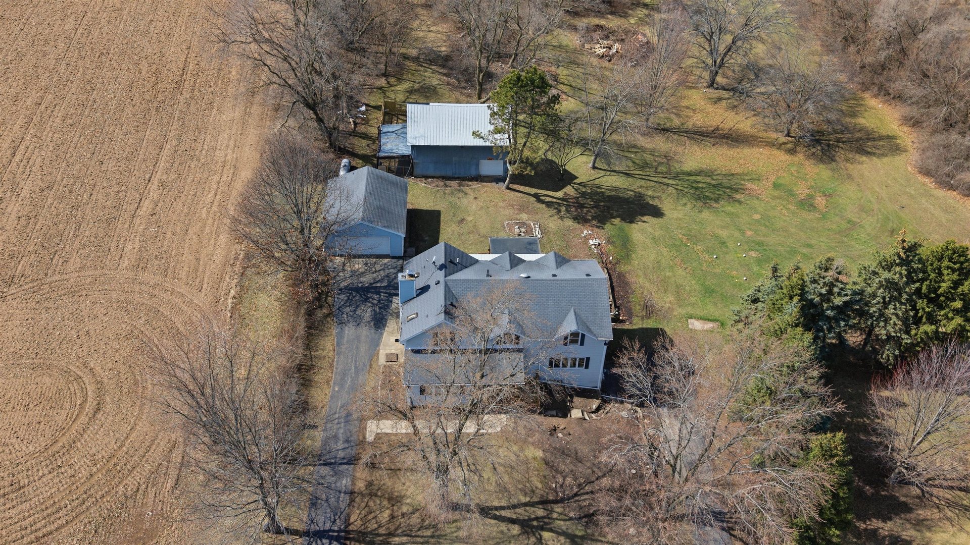 17N620 Ketchum Road Hampshire, IL 60140 - Photo 4 of 50 an aerial view of residential houses with outdoor space