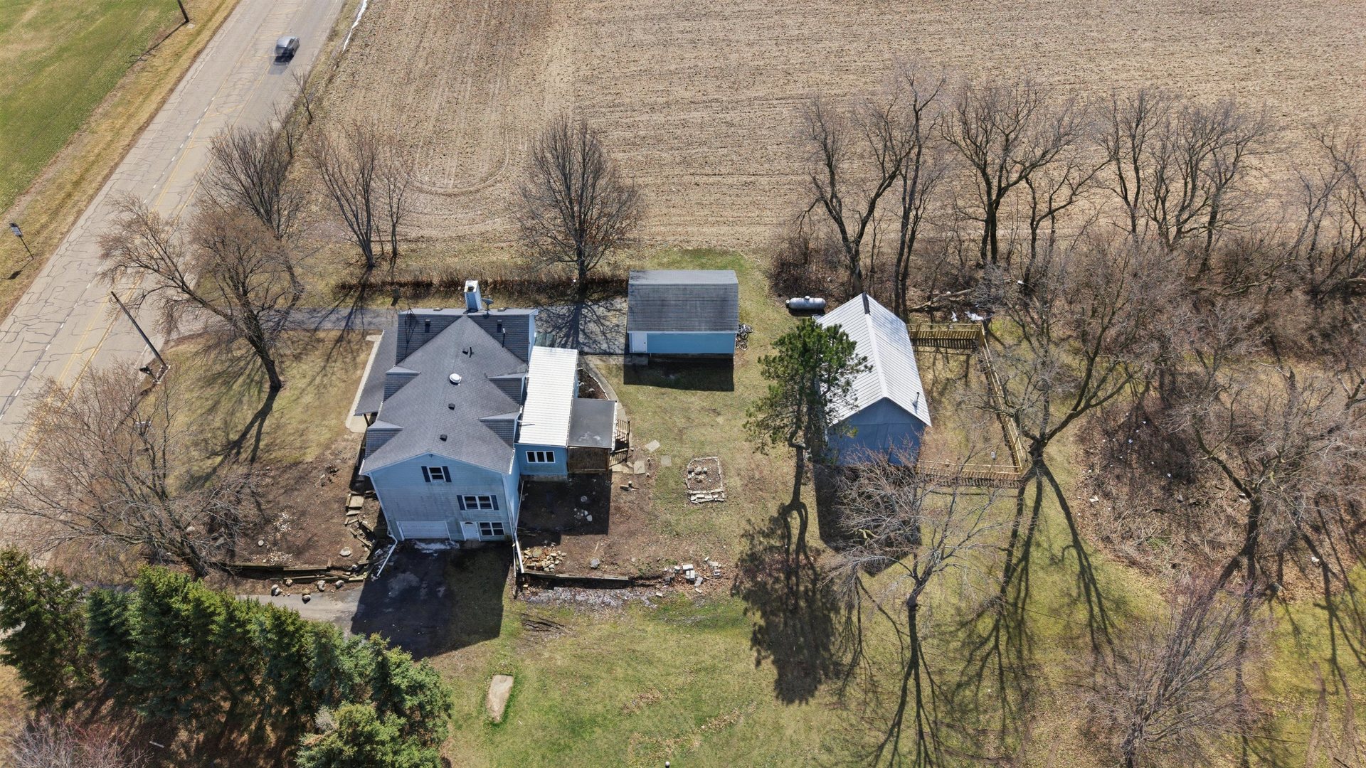 17N620 Ketchum Road Hampshire, IL 60140 - Photo 6 of 50 an aerial view of a house with a yard and covered with snow
