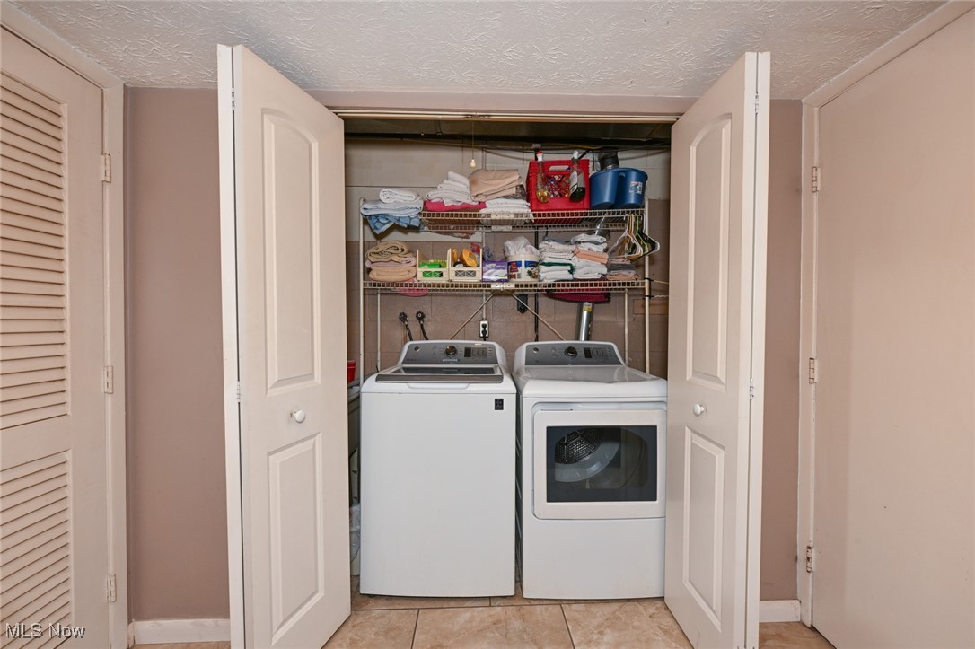 824 South Chillicothe Road, Unit 6 Aurora, OH 44202 - Photo 28 of 35 Ceramic tile floor in laundry closet.
