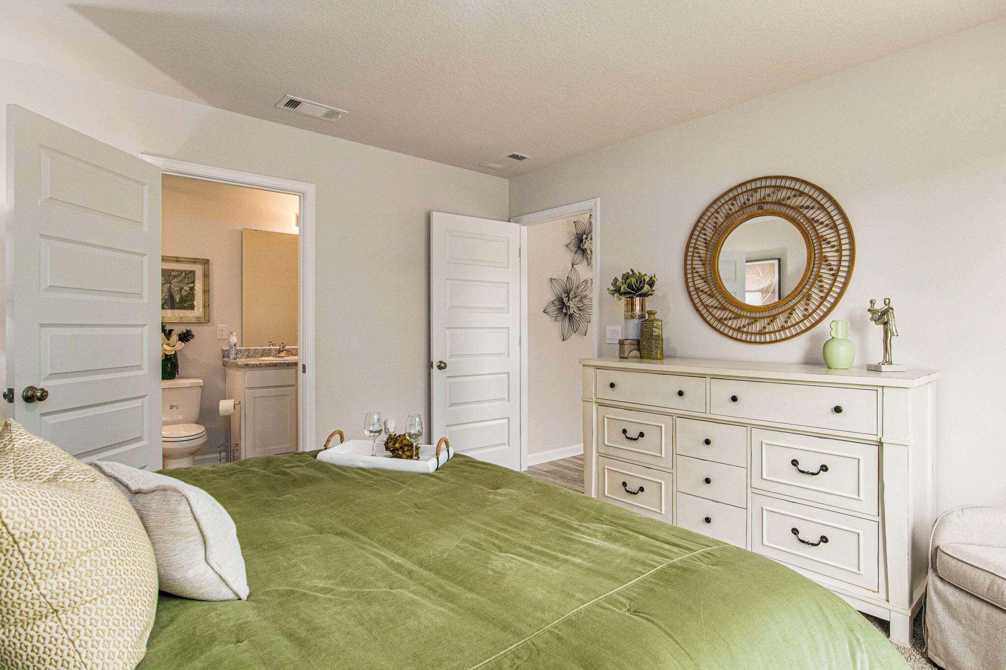 3413 Phoenix Court Crestview, FL 32539 - Photo 13 of 31 a bedroom with a bed and a dresser