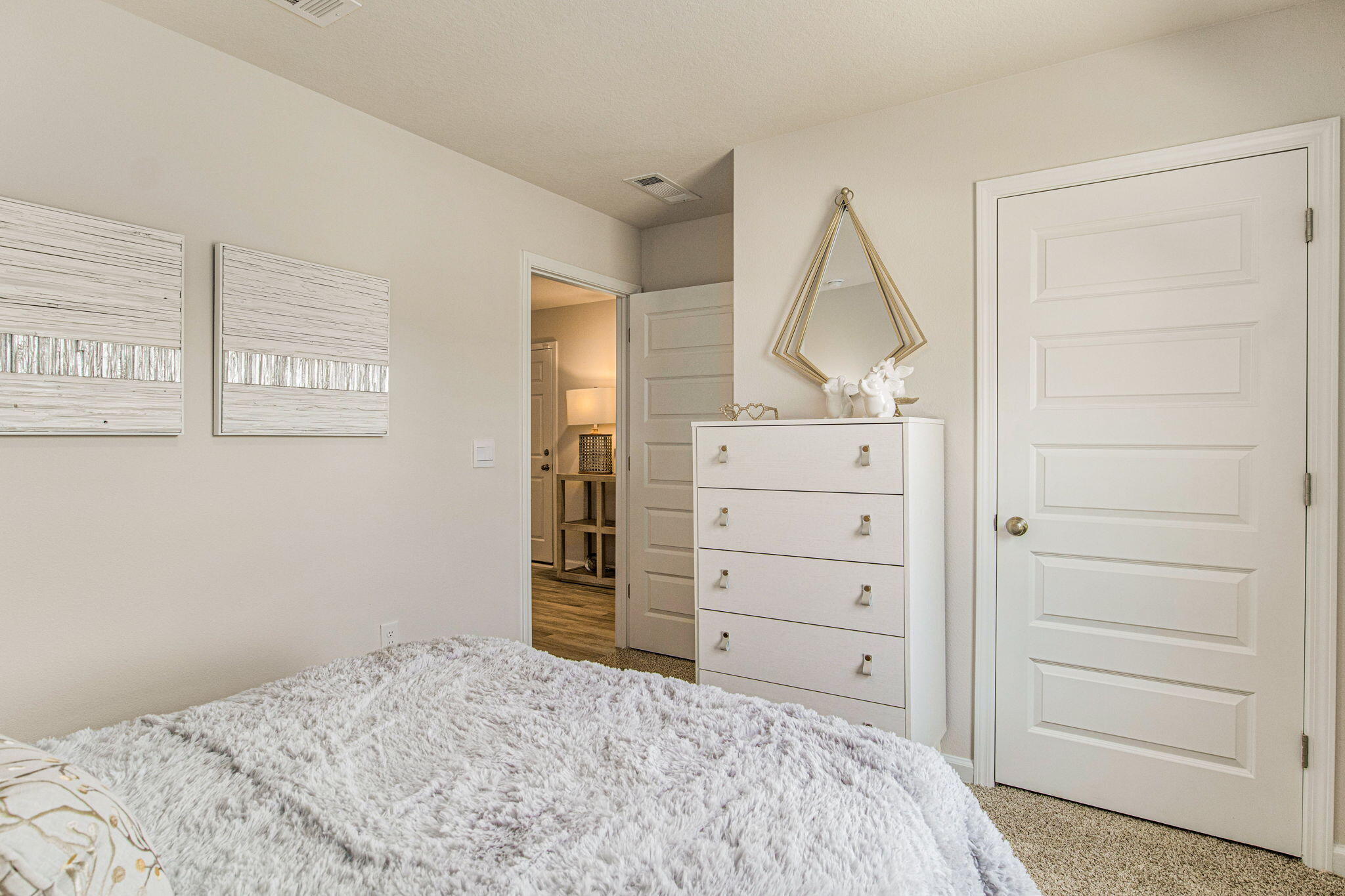 3413 Phoenix Court Crestview, FL 32539 - Photo 27 of 31 a bedroom with a bed and a dresser