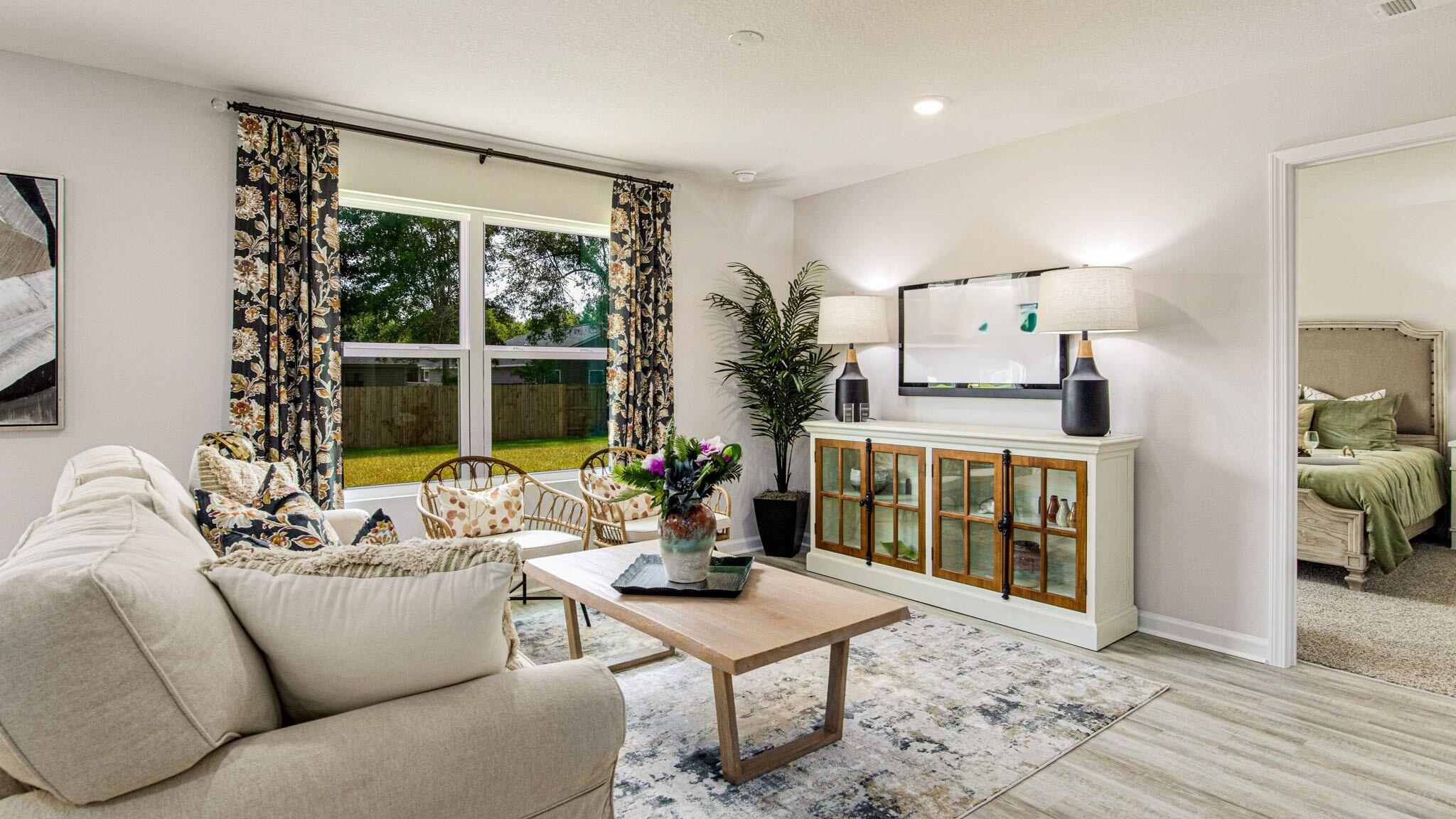 3413 Phoenix Court Crestview, FL 32539 - Photo 9 of 31 a living room with furniture and a large window