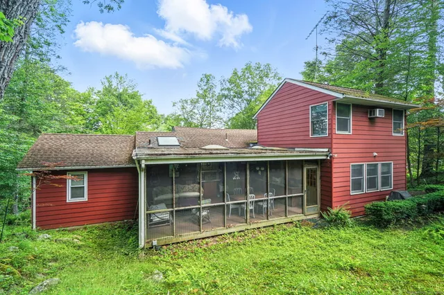 a brick house with a large windows