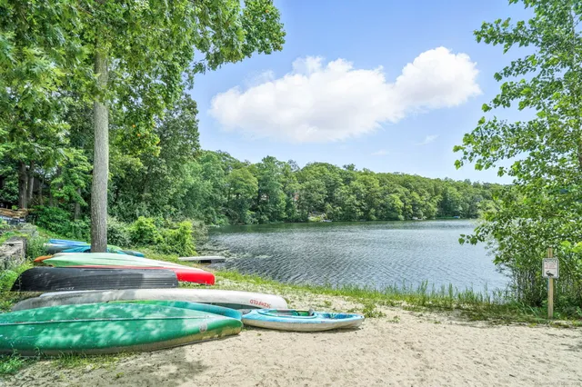 a view of a lake with a yard