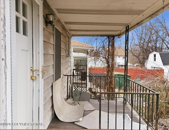 a picture of a bench in front of door