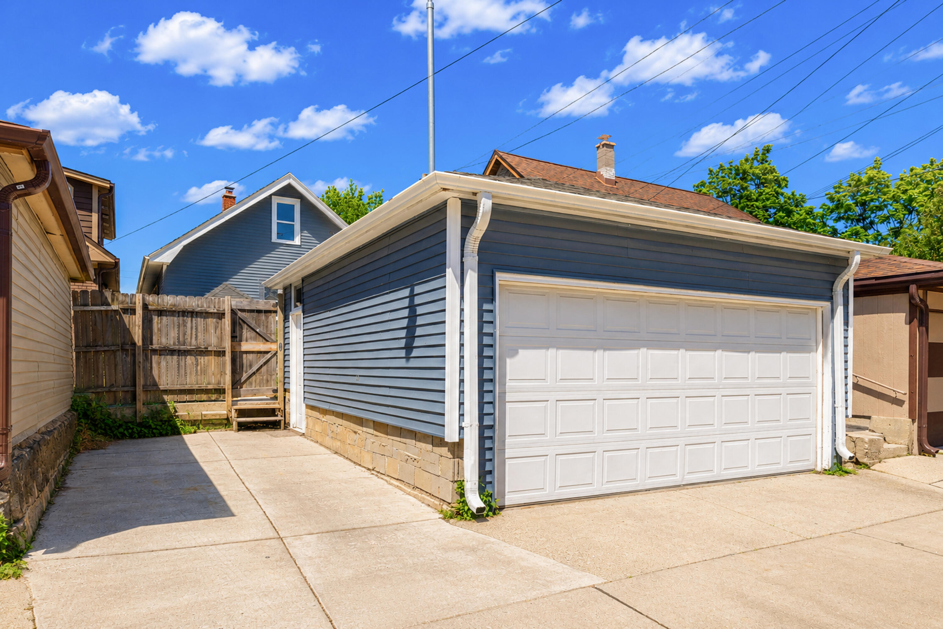 2808 South Greeley Street Milwaukee, WI 53207 - Photo 21 of 23 parking space to left of garage belongs to