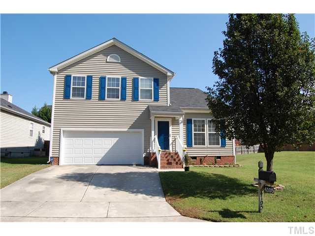 4105 Mantua Way Raleigh, NC 27604 - Photo 1 of 25 a front view of a house with a yard and garage