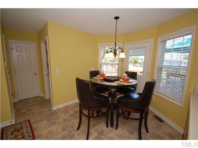 4105 Mantua Way Raleigh, NC 27604 - Photo 12 of 25 a view of a dining room with furniture window and outside view